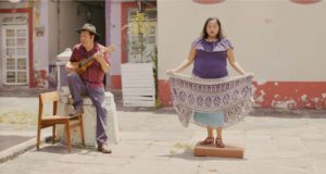 Ramón Gutiérrez Hernández and Minerva Alejandra Velez dancing on the tarima in Veracruz, Mexico